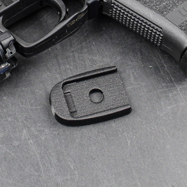 HK USP45 Flush Magazine Floor Plate, made by Total Innovative Tactical Solutions replaces stock magazine base floor plate. Flush magazine floor base plate shown.