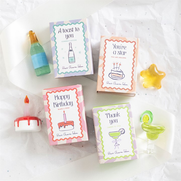 Set of 24 Glass Celebration Charms in Display