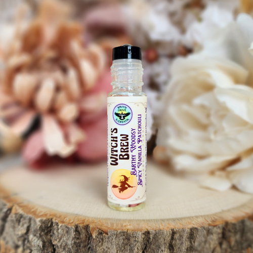 WITCH'S BREW ROLL ON PERFUME OIL - Spiritually Charged to help you Empower, Focus, and Intensify your Spell & Ritual Work! Our Witch’s Brew Oil is a spicy, earthy fragrance with just a hint of dark sweetness!