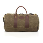 Im Out Duffel bag family by Frost River. ImOut Small No.691, ImOut CarryOn No.693 and ImOut Large No.690. All are made in the USA at Frost River in Duluth, Minnesota from waxed canvas, solid brass hardware and premium leather.