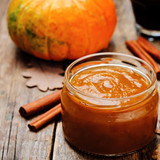 Jar of orange-brown puree with a pumpkin and cinnamon sticks — scent inspiration for Apple Pumpkin Butter fragrance oil
