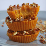 Stacked orange caramel cups topped with chopped nuts — scent inspiration for Pumpkin Caramel Delight fragrance oil