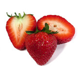 Whole and halved red strawberries on white — scent inspiration for Strawberry fragrance oil