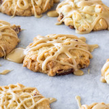 Glazed cookies with cranberries and pecans on parchment — scent inspiration for Oatmeal Maple Crunch fragrance oil
