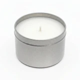 Silver Candle Tin 8oz candle with paraffin wax, single wick, angled view