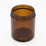 Amber Straight Sided Round Jar 9oz, empty, angled view