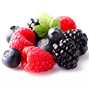 Raspberries, blueberries and blackberries with mint leaf — scent inspiration for Berry Bliss fragrance oil