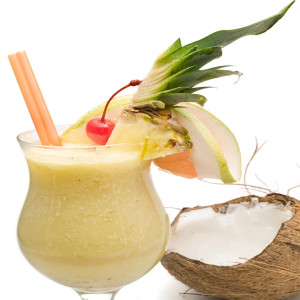 Frothy yellow cocktail with pineapple, cherry, coconut, straw — scent inspiration for Pina Colada fragrance oil