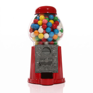 Red gumball machine filled with colorful gumballs — scent inspiration for Bubble Gum fragrance oil