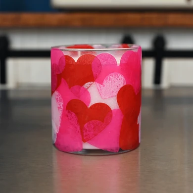 A step by step guide on how to decoupage a candle jar.