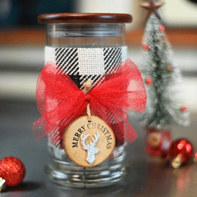Step by step instructions on how to use ribbon to decorate a candle jar.