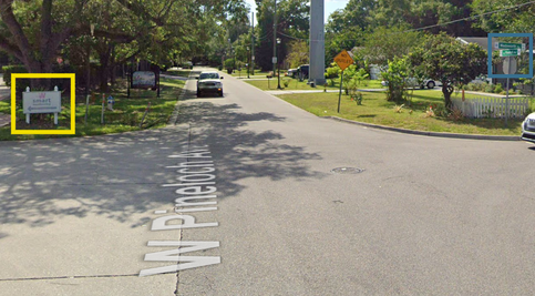 A suburban street view showing W Pineloch Avenue with a grassy roadside and a tree-lined background. A sign for "Smart" in a yellow-highlighted box is visible on the left side of the street. A vehicle is parked on the road.