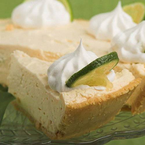 Slice of pie with whipped cream and lime garnish — scent inspiration for Key Lime Pie fragrance oil