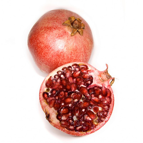 Whole pomegranate and a halved one showing red seeds — scent inspiration for Midnight Pomegranate fragrance oil