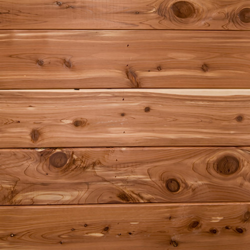 Reddish-brown cedar wood planks with knots — scent inspiration for Cedar fragrance oil