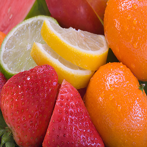 Strawberries, oranges, lemon and lime slices close-up — scent inspiration for Fruit Slices fragrance oil