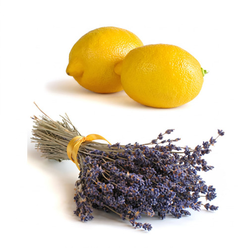 Two yellow lemons and a bundle of dried lavender — scent inspiration for Lemon Lavender fragrance oil