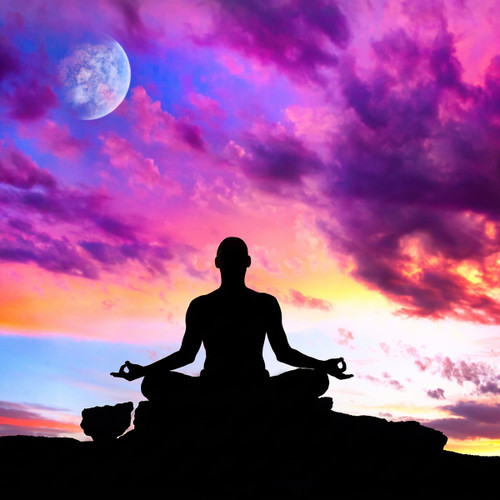 silhouette of person meditating against purple sunset and moon — scent inspiration for Inner Peace fragrance oil