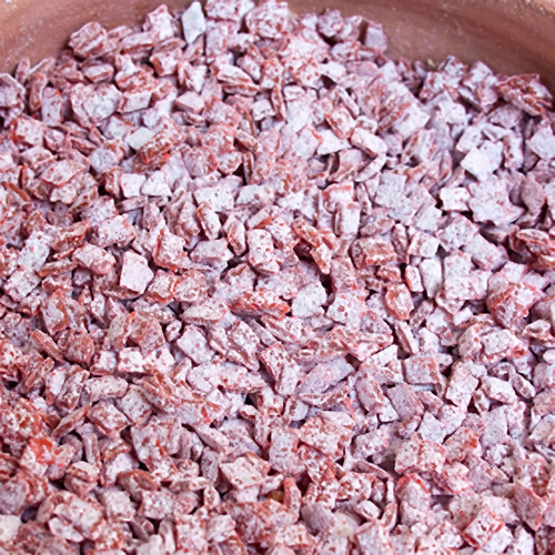 Pinkish-white granular chunks in a terracotta bowl — scent inspiration for Blackberry Frankincense fragrance oil