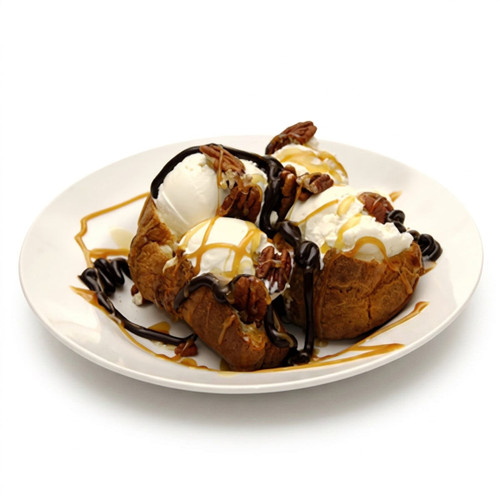 Ice cream with pecans, chocolate and caramel on a plate — scent inspiration for Vanilla Maple Pecan fragrance oil