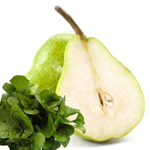 Halved green pear with watercress on white — scent inspiration for Juicy Pear fragrance oil