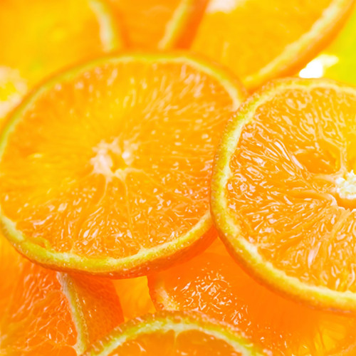Close-up of juicy orange slices stacked together — scent inspiration for Mango Mandarin fragrance oil