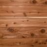 Reddish-brown cedar wood planks with knots — scent inspiration for Cedar fragrance oil