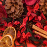 Pinecones, red petals, orange slices and cinnamon — scent inspiration for Hollyberry fragrance oil