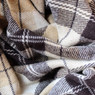 rumpled cream and brown plaid flannel fabric — scent inspiration for Flannel fragrance oil