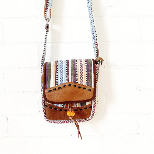 CROSS BODY LEATHER & COTTON BAG cream
Handmade Leather & Cotton Bag 
internal zip with zip enclosure & button flap 
Approx 23x21cm