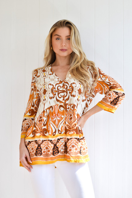 SANCTUM TOP ROYAL
Button up front can be worn as a top or leave open as a cool jacket
Straight 3/4 sleeve

100% rayon