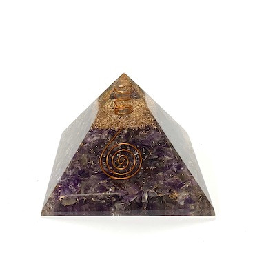 Orgonite Pyramid Amethyst
Assort Gold embossed symbol.
Check our crystal page for Amethyst healing properties.
ORGONITE refers to a mix of crystals and or semi-precious gemstones, metals and resin in a combination that may balance out our life-energy. This natural Earth energy is considered the most powerful energy there is and the frequency it resonates is considered the “heartbeat” of our planet.

The organic materials absorb the vital, orgonic energy, while the non-organic materials disperse it back in all directions.

Crystals & precious gemstones are electrically charged by the resin, that contracts them. Hence, the powerful healing effects of the crystals are magnified in an orgone pyramid.

Benefits of Orgone Pyramids:

When placed in your work, living or sleeping space, the orgone pyramids have the ability to clean the energies in the room & protect the individuals from EMF radiation. Laboratory research shows that living body cells strengthen their immunity & reach optimal physical & psychological health.

This includes:

Help insomnia & improve sleep & vivid & pleasant dreams

Improves immunity & resistance to illness, enhances energy & overall wellness

Protection from EMF radiation caused by electronic devices

Create a peaceful environment by enhancing positive energies

Access deeper meditative states, strengthen visualisations & intentions

Project high vibrational energies the minimise stress

Assists in imbalances as if they know what one needs on a spiritual level.

There are many Orgone Pyramids for many uses.