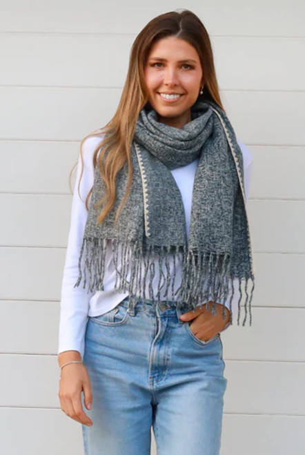 Scarf Edging Denim
Textured with contrasting colour
Beautiful soft scarf with tassels
Polyester