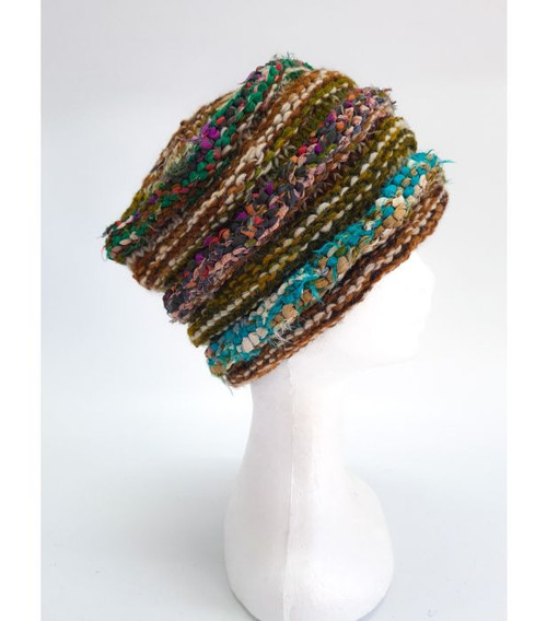 Beanie Ribbed Green
Wool & recycled silk ribbed beanies with soft inner fleece lining handknitted in Nepal.

As these are handmade, each piece has its own character and colours may vary.