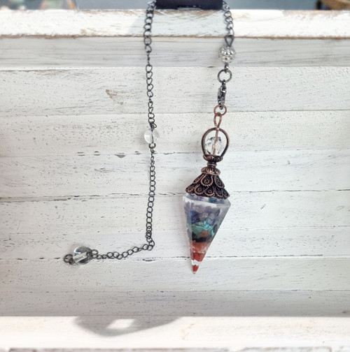 Orgonite Pendulum Chakra

Pendulums are often used for divination, helping individuals gain insights and answers to their questions. 
They assist in balancing energy fields and cleansing negative energy. 
Pendulums help connect to one's intuition and can be used for personal healing and inner growth. 
They serve as a tool for communication with higher beings or spirit guides. 
Overall, pendulums are versatile tools in spiritual practices, aiding in decision-making and enhancing spiritual connections. 

Chakra stones are crystals that resonate with the body's energy centers, known as chakras. Here are the 7 main chakra stones and their associated meanings:
Root Chakra: Red Jasper - Promotes stability and grounding. 
Sacral Chakra: Carnelian - Enhances creativity and passion. 
Solar Plexus Chakra: Citrine - Boosts confidence and personal power. 
Heart Chakra: Rose Quartz - Encourages love and compassion. 
Throat Chakra: Tourmaline - Aids in communication and expression. 
Third Eye Chakra: Amethyst - Enhances intuition and spiritual awareness. 
Crown Chakra: Clear Quartz - Promotes clarity and connection to the divine. 

These stones can be used for healing and balancing energy by placing them on the corresponding chakra points or carrying them throughout the day. 
3

Orgonite is a powerful tool for energy healing and protection against electromagnetic frequencies (EMFs).

Developed in the 20th century by Wilhelm Reich, orgonite is often described as a form of energy that is omnipresent and vital for our well-being.

It is believed to be a combination of organic and inorganic materials, such as resin and quartz crystal, that can harmonize and balance the energy levels in our environment.