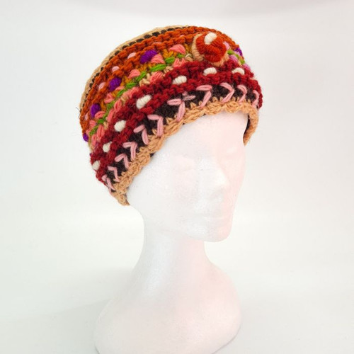 Headband Flower Rust
Woollen items with floral embroidery handmade in Nepal.

Inside of all are lined with soft fleece.

Free size. As these are handmade, sizing may vary.

The main background colour will be as per images however the colour of embroidery/stitching may vary.