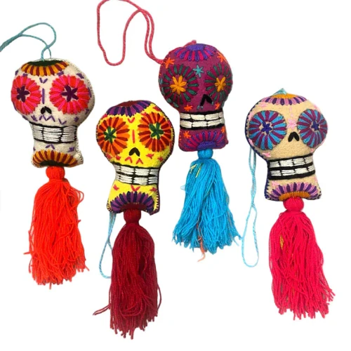 Mexican Sugar Skulls
Add vibrant Mexican folk art flair to your store with these exquisite handcrafted felt sugar skulls from the Chiapas region of Mexico. Made by skilled artisans, each piece features bold embroidery and intricate detailing, capturing the rich cultural heritage of Día de los Muertos.

These eye-catching sugar skulls are beautifully unique and make standout accessories for home décor, bag charms, or meaningful gifts that celebrate tradition and creativity.

Available in a mix of bright colours.