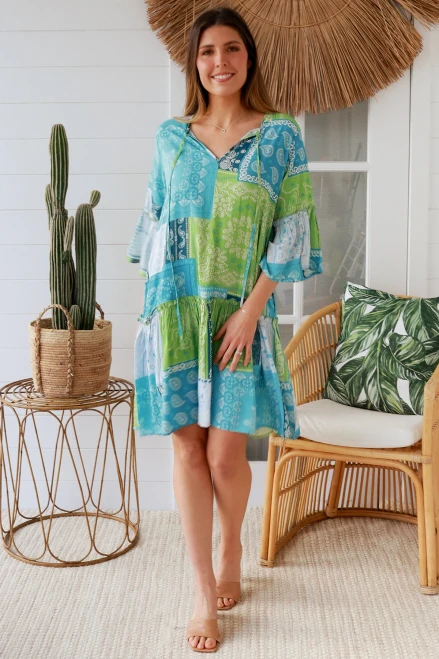 Dreamcatcher Lavern Dress
3/4 sleeve
Tie neck
100% Rayon

The placement of the pattern may vary from style to style, making each piece unique.

Breathable Fabric, soft and comfortable
Strong and extremely absorbent.
Soft and comfortable.
Drapes well and does not have a problem with static.
Made in a variety of qualities and weights and can be made to resemble natural fabrics.
Can wrinkle easily.
Shrink by 5-10% after wash.
Cut oversize to allow for shrinkage (After shrinkage, the garments fall into the appropriate size ranges)