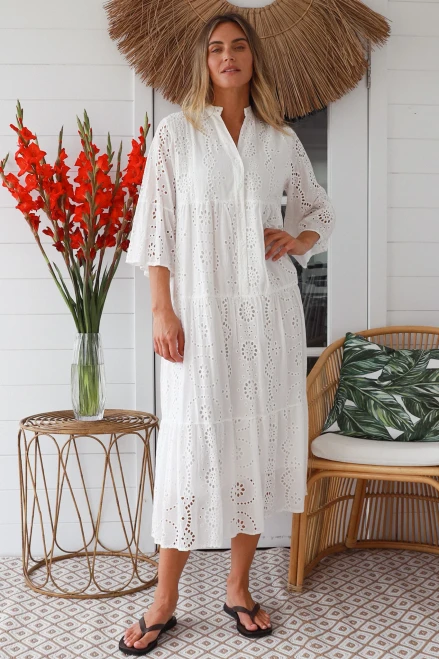 Salty Palm Maxi Lace Dress
Button to below waistline
3/4 sleeve
Fully lined
Eyelet Embroidery
SM = 10-14
 ml = 14-18
100% Cotton

Breathable Fabric, soft and comfortable
Strong and extremely absorbent.
Soft and comfortable.
Drapes well and does not have a problem with static.
Made in a variety of qualities and weights and can be made to resemble natural fabrics.
Can wrinkle easily.
Shrink by 5-10% after wash.
Cut oversize to allow for shrinkage (After shrinkage, the garments fall into the appropriate size ranges)