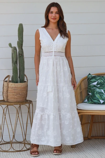 Salty Palm Maxi Sleevless Moffit Dress
Lace feature around waistline with elastic at back
Braiding around neckline
Sleeveless
Fully lined
Embroidered Moffit's

SM = 8-10
ml = 12-14

100% Cotton

Breathable Fabric, soft and comfortable
Strong and extremely absorbent.
Soft and comfortable.
Drapes well and does not have a problem with static.
Made in a variety of qualities and weights and can be made to resemble natural fabrics.
Can wrinkle easily.
Shrink by 5-10% after wash.
Cut oversize to allow for shrinkage (After shrinkage, the garments fall into the appropriate size ranges)