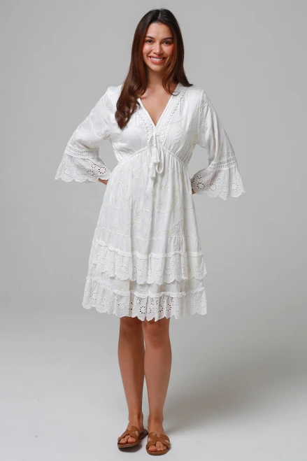 Salty Palm Embroidered Dress
Elastic at waist
Braiding around neckline with tassel tie
3/4 sleeve
Fully lined
Embroidered and lace detail

SM = 8-12
ml = 12-16

100% Cotton

Breathable Fabric, soft and comfortable
Strong and extremely absorbent.
Soft and comfortable.
Drapes well and does not have a problem with static.
Made in a variety of qualities and weights and can be made to resemble natural fabrics.
Can wrinkle easily.
Shrink by 5-10% after wash.
Cut oversize to allow for shrinkage (After shrinkage, the garments fall into the appropriate size ranges)