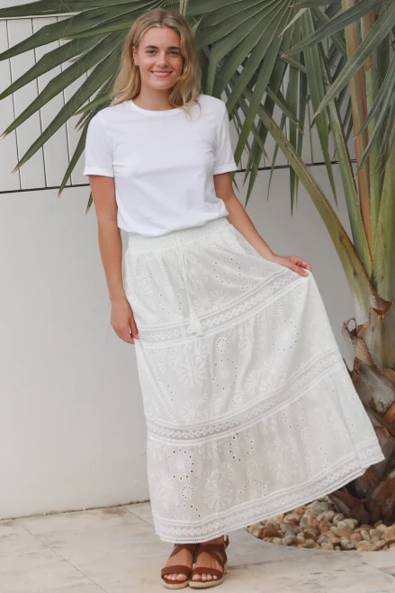 Salty Palm Embroidered Maxi Skirt
Wide elastic waistband with drawstring
Fully lined
Embroidered and lace detail

SM = 8-12
ml = 12-16

100% Cotton

Breathable Fabric, soft and comfortable
Strong and extremely absorbent.
Soft and comfortable.
Drapes well and does not have a problem with static.
Made in a variety of qualities and weights and can be made to resemble natural fabrics.
Can wrinkle easily.
Shrink by 5-10% after wash.
Cut oversize to allow for shrinkage (After shrinkage, the garments fall into the appropriate size ranges)
