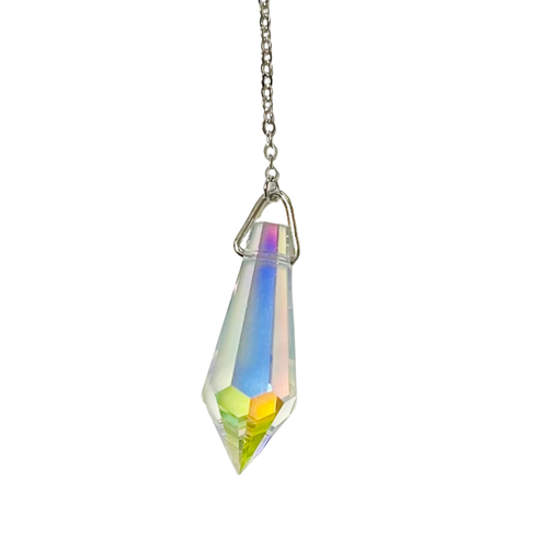 Crystal Pendulum Aura Quartz 
Connect with Clarity. Trust Your Inner Wisdom.

Pendulums are a powerful tool used to bridge the conscious and subconscious mind, helping you access inner guidance and make intuitive decisions in your everyday life. Whether you're using it for personal insight, energy work, or divination, a pendulum invites stillness, focus, and alignment.

 

Crafted from radiant Aura Quartz, this pendulum reflects subtle iridescent hues and carries the uplifting energy associated with balance, clarity, and emotional harmony.

 