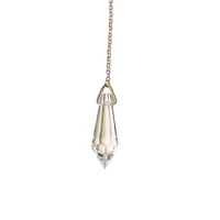 Pendulum Crystal Quartz 
Elegant. Reflective. Ready for Intuitive Work.

This crystal-look pendulum offers a sleek and simple option for those beginning their journey into dowsing or intuitive guidance. Designed to resemble Clear Quartz, it provides a clean, neutral energy feel and is ideal for practice, learning, or light spiritual work.

 
Product Details
Glass crystal made to resemble Clear Quartz

Smooth, pointed shape for easy, balanced movement

Comes with a tulle pouch for safe keeping