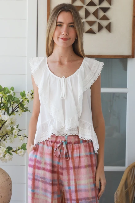 Salty Palm Frill Top
Gorgeous cotton & lace top
Frill around neckline & bodice
Tie at neck
100% cotton