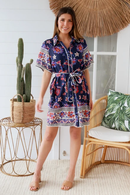 Dreamcatcher Diana Shirt Dress
Button up front
Can be worn with belt or without
100% Bamboo Rayon 

Please Note: The placement of the pattern may vary from style to style, making each piece unique.

Breathable Fabric, soft and comfortable
Strong and extremely absorbent.
Soft and comfortable.
Drapes well and does not have a problem with static.
Made in a variety of qualities and weights and can be made to resemble natural fabrics.
Can wrinkle easily.
Shrink by 5-10% after wash.
Cut oversize to allow for shrinkage (After shrinkage, the garments fall into the appropriate size ranges)

Hand washing is best for washable rayon garments.
It may shrink, stretch, and possibly bleed dyes all over from being washed in hot water in a washing machine or dried in a dryer
Rayon does not melt but burns at high temperatures.
Most of the washable rayon garments today are labeled "hand wash, cool water, drip dry or dry flat". This is important to follow because when rayon is wet, it loses 30% to 50% of its strength.