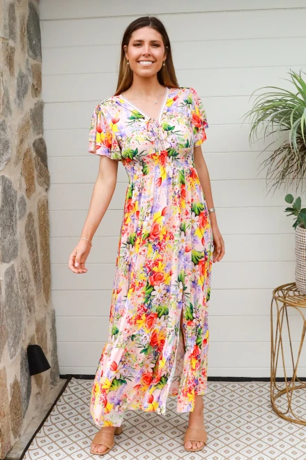 Charlotte Freya Dress 
Tye up front with v neck
Lace detail
Shirring under bustline
Short butterfly sleeve
Low frill layer at hemline

100% Rayon

Please Note: The placement of the pattern may vary from style to style, making each piece unique.

Breathable Fabric, soft and comfortable
Strong and extremely absorbent.
Soft and comfortable.
Drapes well and does not have a problem with static.

Can wrinkle easily.

