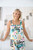 Salty Bright Top Summer Sky
Cute little top with adjustable shoulder straps
Square front with functional buttons up front
Pin pleats either side of buttons
100% rayon
