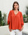 Boho Top Rust
V-Neck Balloon Sleeves Lace Detailed Top
Deep V front with delicate strap accent
Voluminous long sleeves with lace panel detailing
Gathered yoke for soft drape and ease
Oversized, may want to size down
Fabric: 100% Rayon