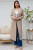 Charlotte Long Cardi Cream
Lovely soft & warm 
2 front pockets
76% poly
13% nylon
8% wool
3% spandex